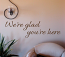 We're Glad You're Here Wall Decal 